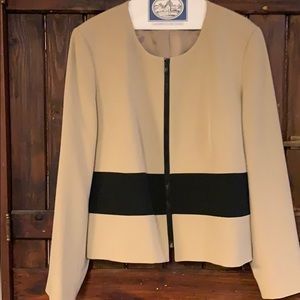 A tan and black blazer